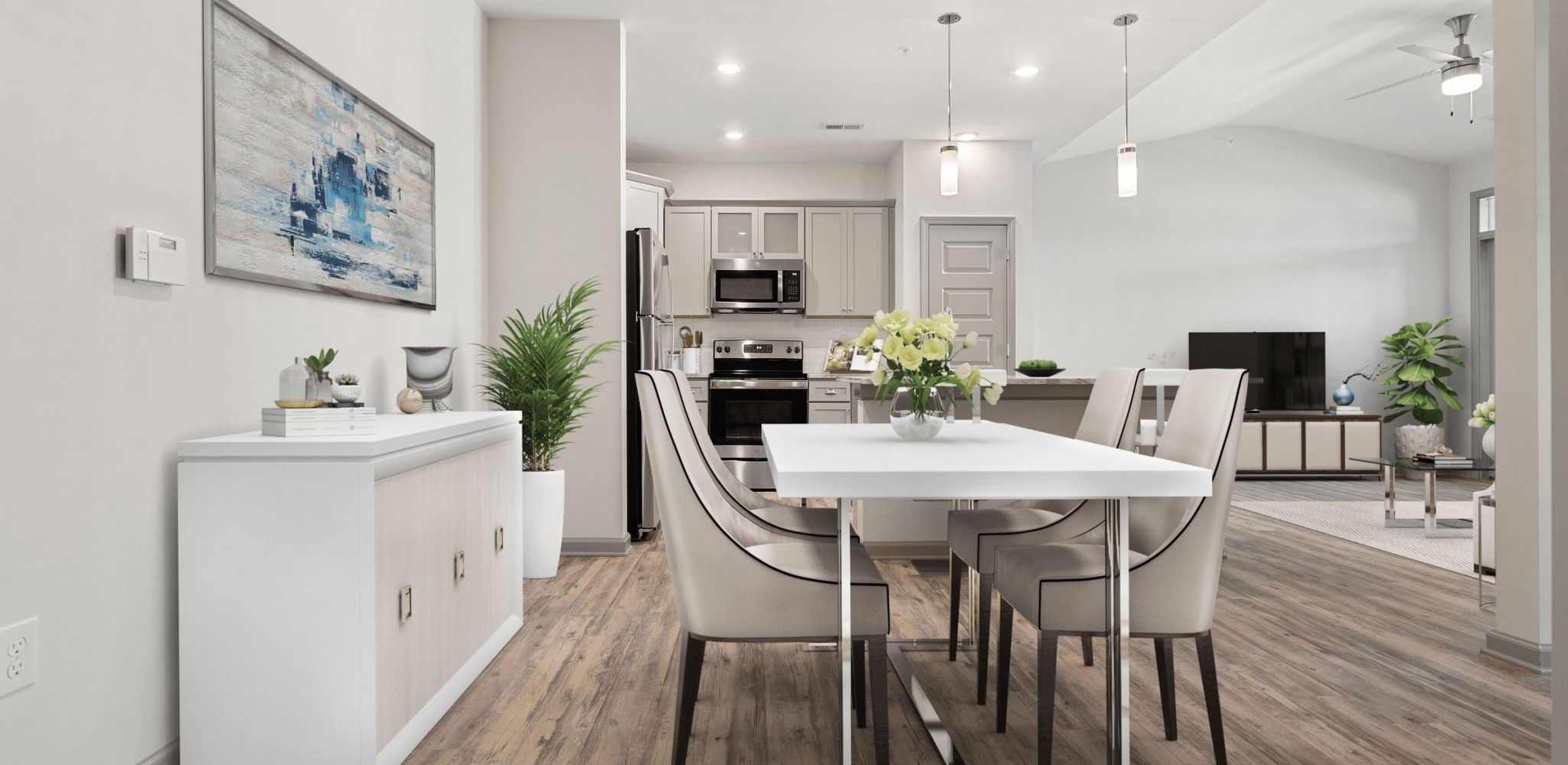 Hawthorne at Westport luxury apartment living room and kitchen with dining table area