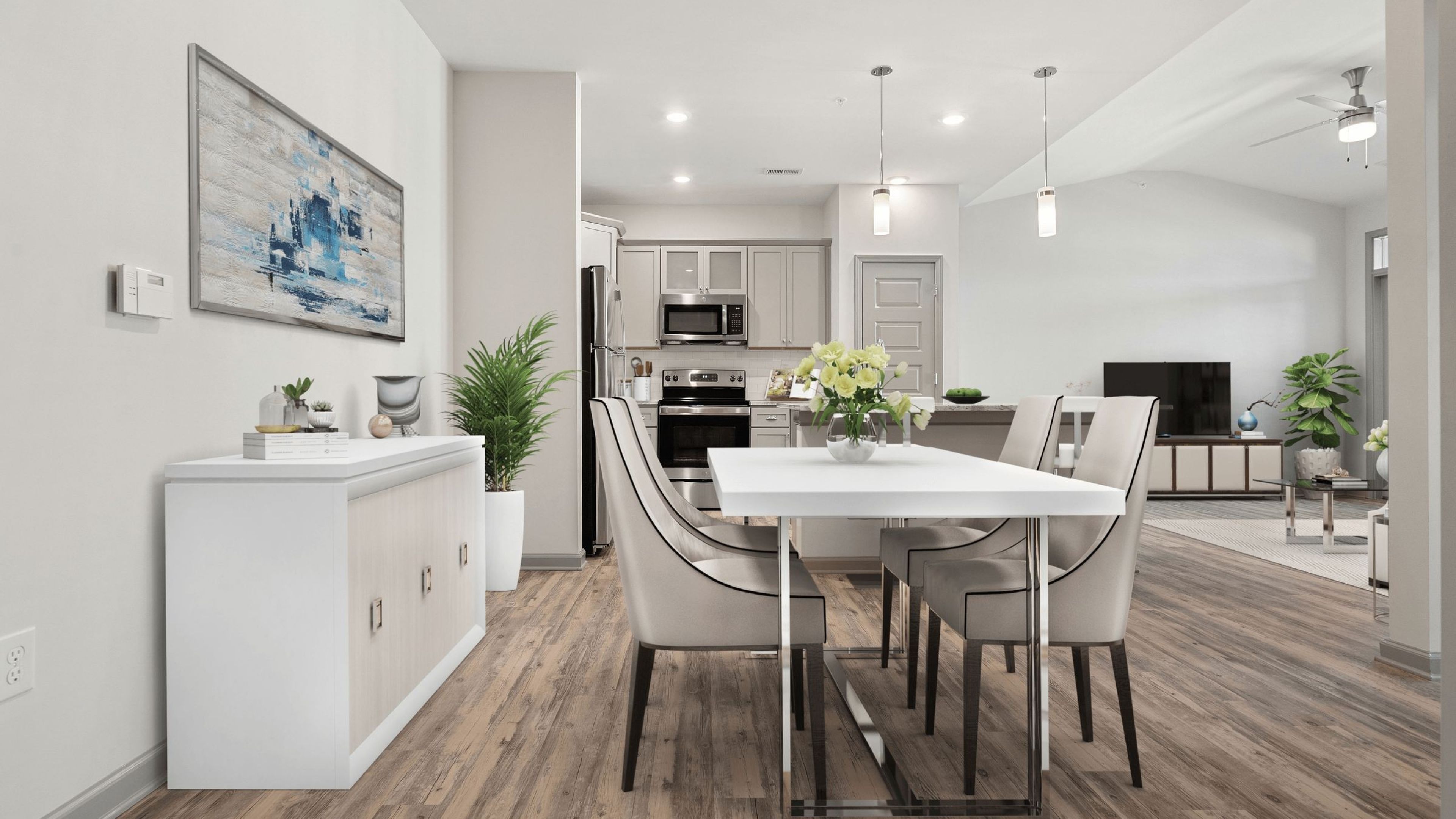 Hawthorne at Westport apartment dining area and kitchen with pendant lighting